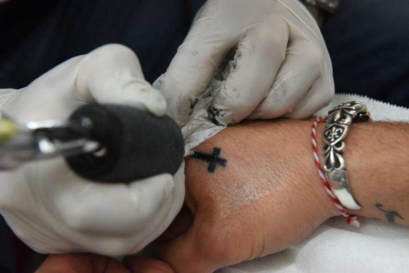 What It's Like to Get Tattoo With Ancient Stamps at Razzouk, Jerusalem